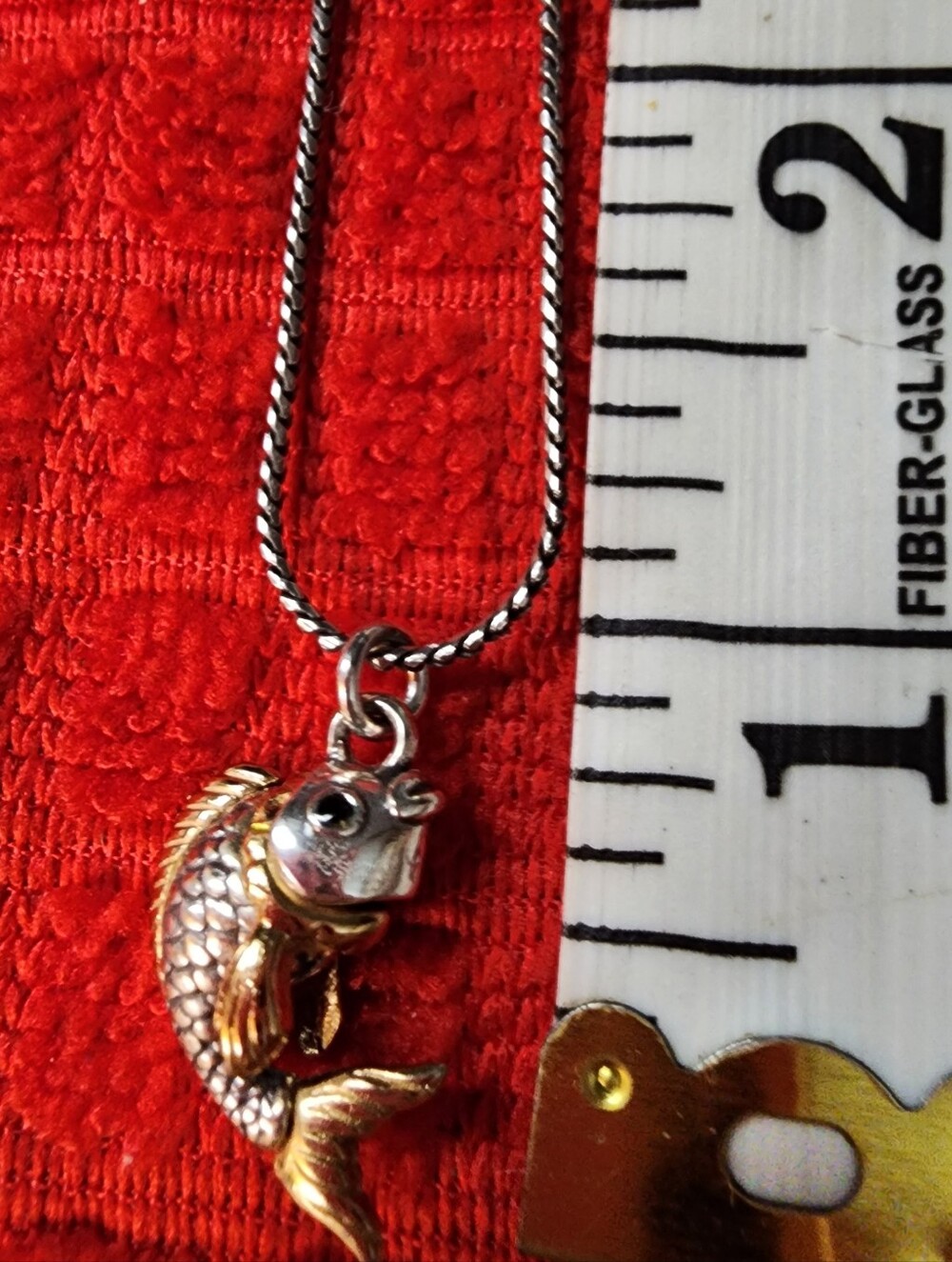 Fossil Necklace With The Awesome Silver And Gold Fish Pendant!